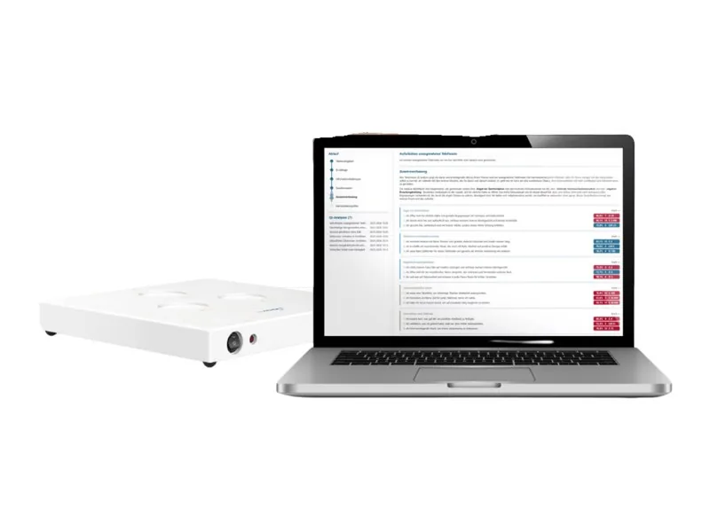 TimeWaver のデバイスと、ノート PC の写真。 画像の中の文:小さな文字(判読できない)